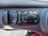 a close up of a car ' s dashboard controls