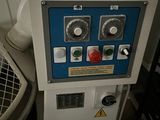 a machine that is sitting on a table in a room