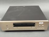 a close up of a cd player sitting on top of a table