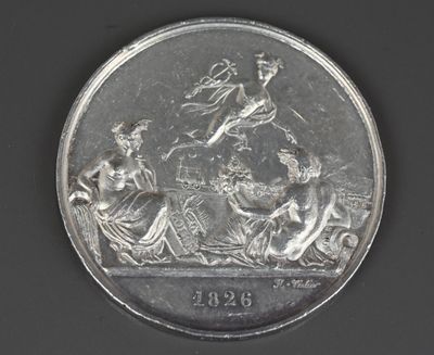une pièce d'argent à l'effigie d'une femme à cheval