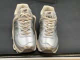 new balance shoes in box with box on the floor