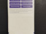 the back of a box of a cell phone on a black surface