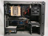 the inside of a computer case with a lot of electronics inside of it