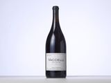a bottle of wine that is sitting on a table