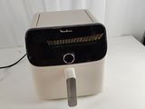 an image of a toaster sitting on top of a white table