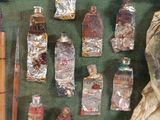 a display of various bottles of alcohol and other items