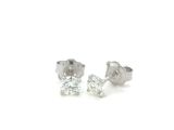 a pair of diamond stud earrings on a white background