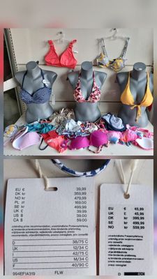 several mannequins are displayed on a table with price tags attached to them