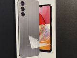 a box with a samsung a40 phone in it sitting on a table