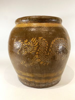 Asie du sud Jarre en grès à décor en léger relief jaune d'un…