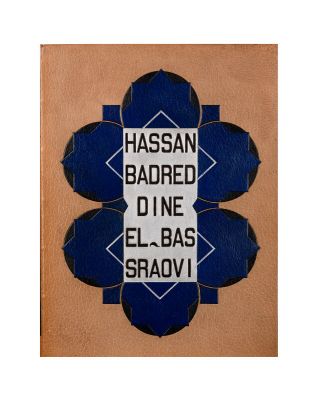 a blue and white sign that says hassan beaded dine elbass sravvi