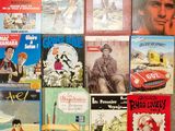 a lot of books that are on the table