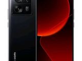 the back of a black smartphone with a red light on the screen