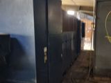 a room that has a bunch of lockers in it