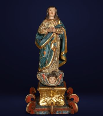 an image of a statue of a woman holding a child in her arms