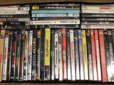 a lot of dvds in a box on the table