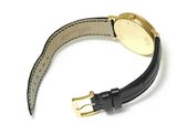 an image of a watch with a black leather strap and a gold buckle