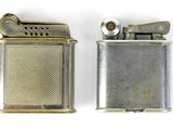 two lighters that are sitting side by side on a white surface