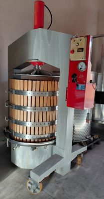 an image of a machine that is making wine in a winery