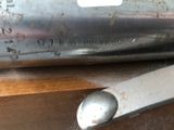 a close up of a pair of scissors on a table