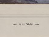 an old book with a picture of a lighthouse in the background
