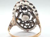an image of a ring with a flower design on it