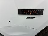 a close up of a sticker on a car ' s bumper