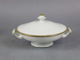 an image of a white bowl with gold trim and a lid