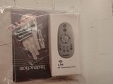 a box of remote controls sitting on a table