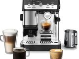 an image of a coffee machine with a cup of coffee next to it