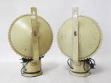 pair of antique yellow metal lamps with scallops on each side