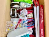 a box full of items that are sitting on the ground