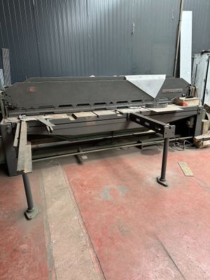 an image of a machine that is sitting in a warehouse