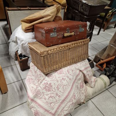 several suitcases stacked on top of each other in a room