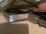 a person that is holding a whisk in their hand