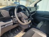 a steering wheel and dashboard of a vehicle