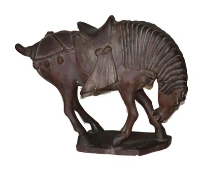statue of a horse with a saddle on it ' s back on a white background