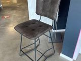 a chair that is sitting in the middle of a room