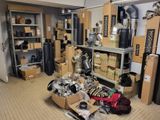 a room filled with lots of boxes and pots and pans
