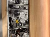 a cabinet with many items in it in a store