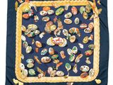 an image of a blue scarf with a picture of a bunch of birds on it