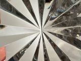 a close up view of a glass plate with a circular design