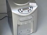 a computer and a printer sitting on a desk