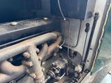 a close up view of an old engine in a truck