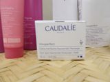 many different types of skin care products sitting on a table
