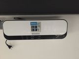 an image of a car rear view mirror mounted on a wall