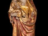 an image of a statue of a woman holding a child