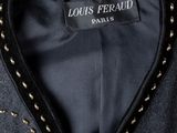 a close up of a black jacket with gold studding