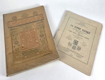 two books sitting on top of a table next to each other