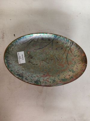 une photo d'une assiette sur laquelle est accrochée une étiquette